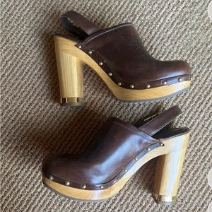 the cutest tory burch heeled clogs! worn 3 times at most (see pic with soles).